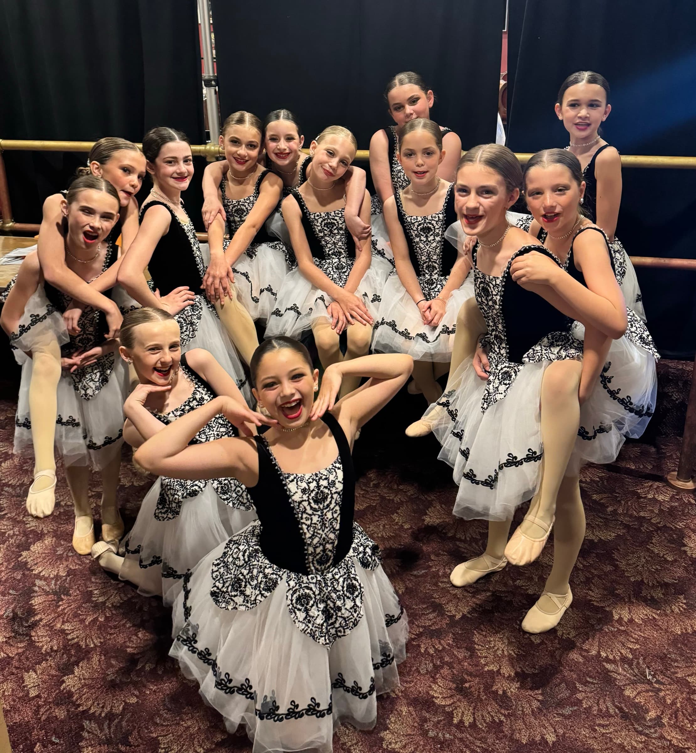 Company dancers backstage in costume