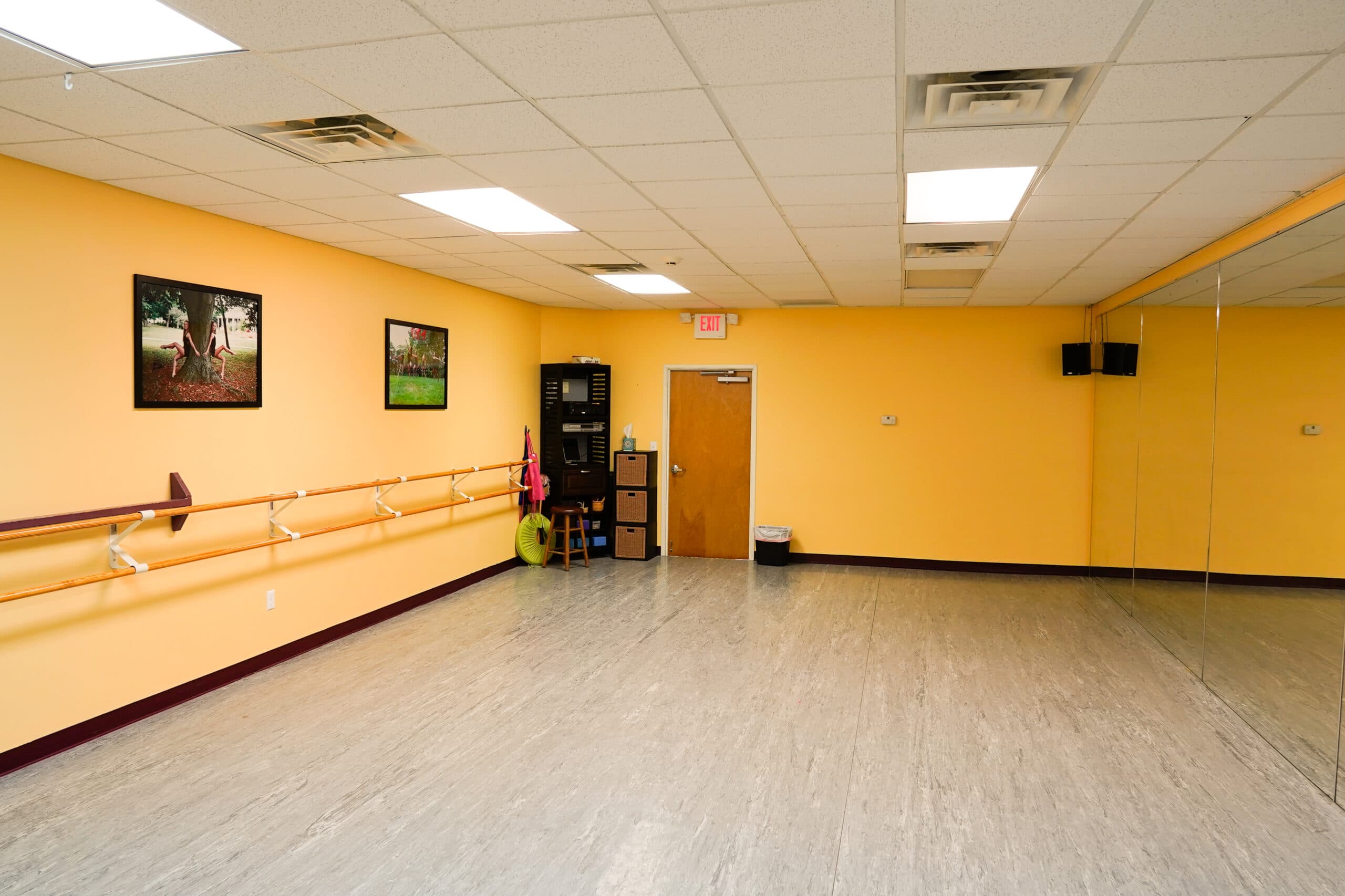 Acro and tumbling room with mats and barre