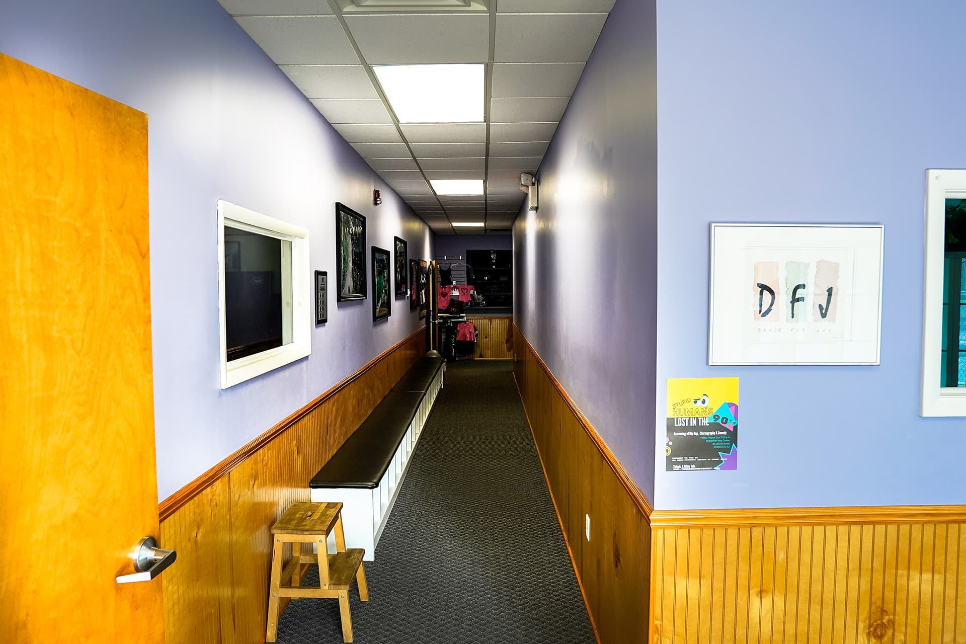 Hallway leading into the studio, lined with photos and show posters